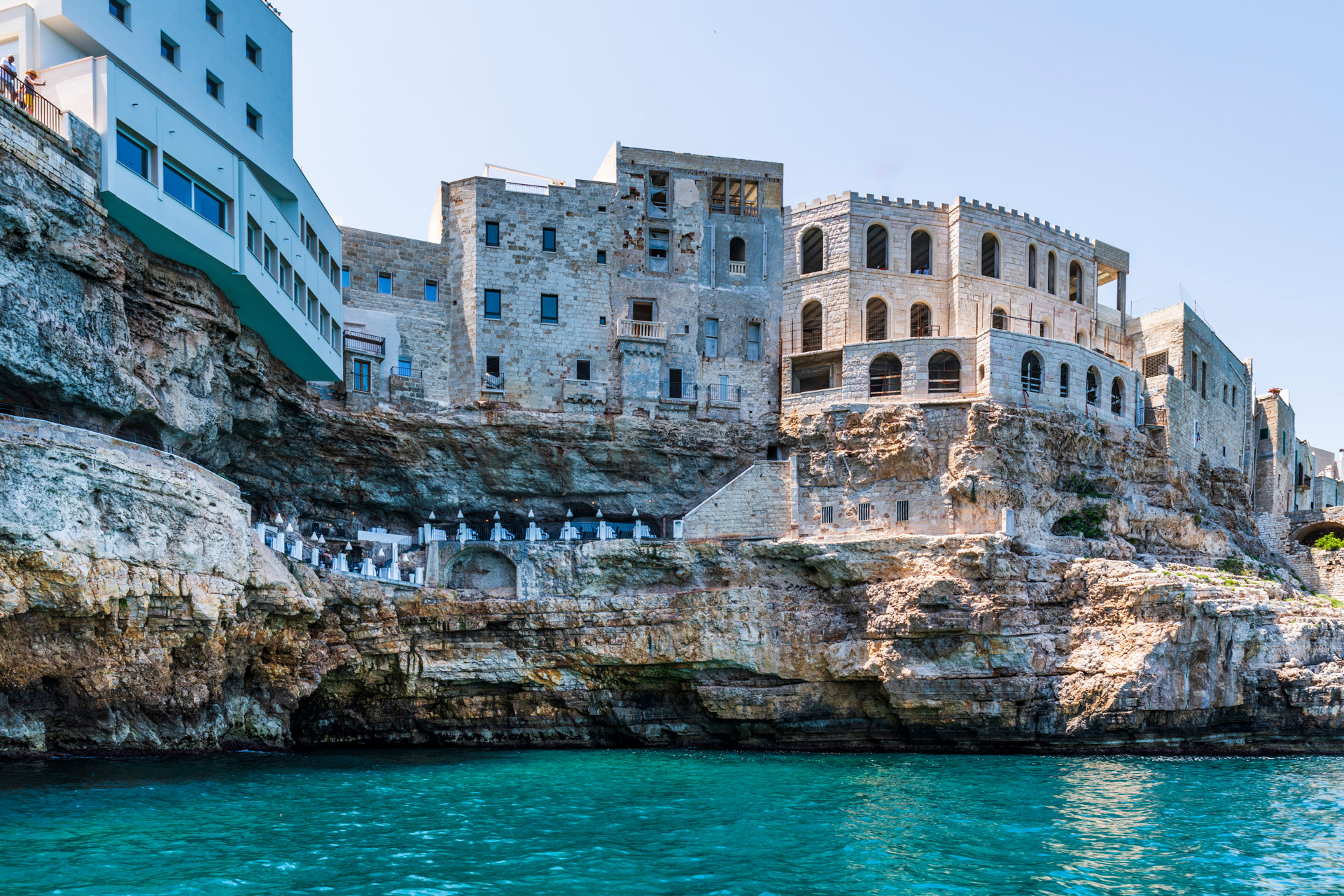 Polignano,A,Mare,Seen,From,The,Sea.,Cliffs,And,Caves